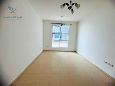Annual apartment in City Tower, one bedroom, two bathrooms, balcony and private parking, Khalifa Street, near Safeer and Grand Mall, easy Dubai access