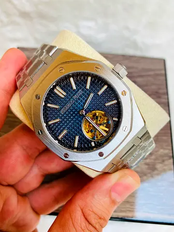 This luxury timepiece is an automatic watch 42 mm Audemars Piguet Royal Oak Tourbillon featuring a s