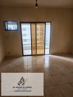 Spacious 2-Bedroom Apartment in Al Majaz 2 with Prime Location Near All Services, Clear Sharing Cont