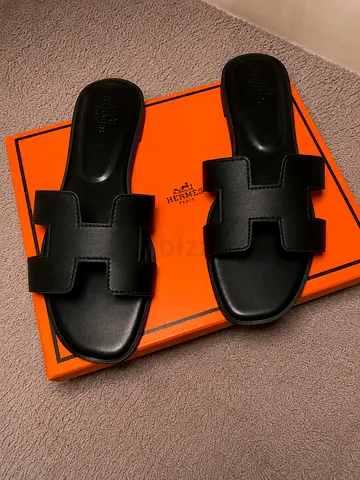 black Hermes slippers
