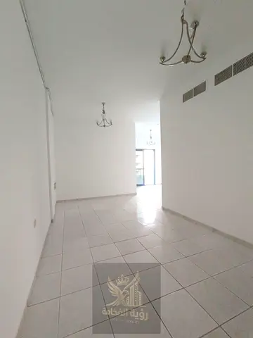 Two-Bedroom Apartment in Al Qasimia Al Nad | Balcony + 1 Month Free