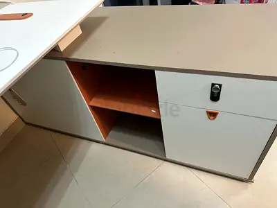 L-shaped modern office desk with storage unit - sturdy and clean