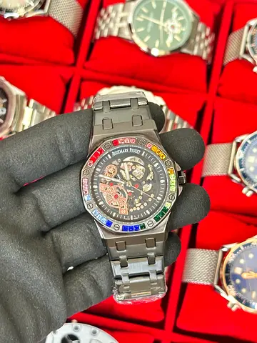 Men's stainless steel skeleton watch with rainbow bezel (preowned)