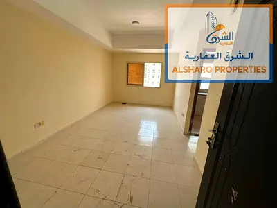 For annual rent: a beautiful one-bedroom apartment in Al Nuaimiya 2, on College Street, with central air conditioning and card access to the building.