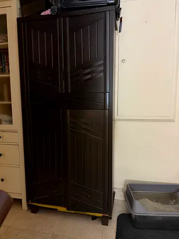 Wood shoe cabinet.