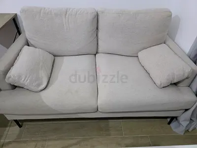 Light grey 2-seater fabric sofa – good condition