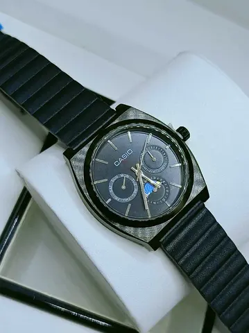 Casio men's watch with blue dial and rubber strap - good condition