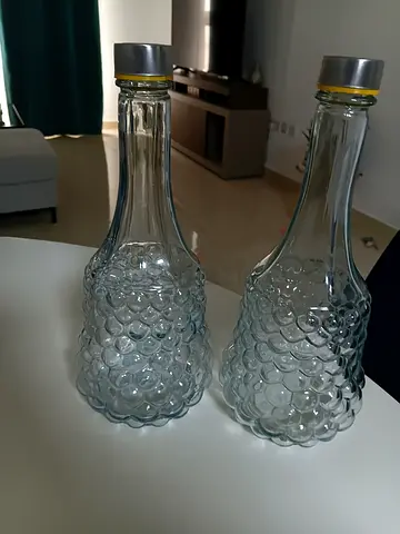Pair of Decorative Glass Bottles with Metal Caps