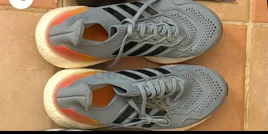 Light blue adidas running shoes, size (please confirm)