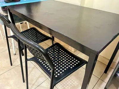 iKEA Sturdy Black Wooden Dining Table with four black chairs– Good Condition