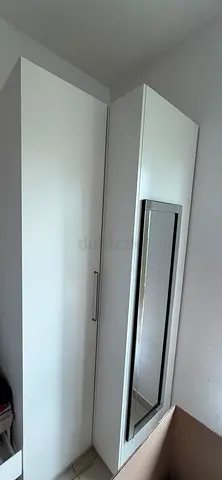 White tall wardrobe with full-length mirror, excellent condition. Easy to dissemble / reassemble
