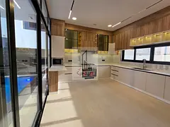 🏡 **Luxury villa for sale in Al Helio – Ajman | Private pool | High-end finishes | Freehold own