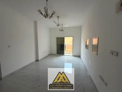 2BR in Al Mowaihat 3, second tenant, 3 baths, 2 balconies, central AC, AED 42K, 4 payments.
