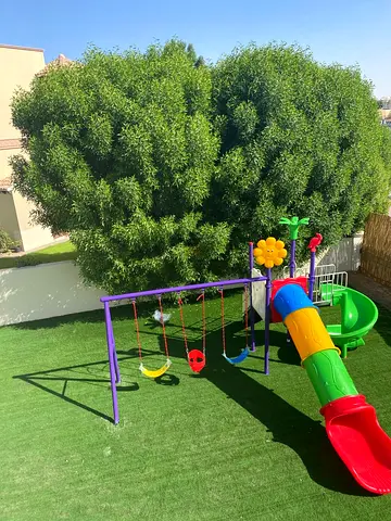 Outdoor kids playset with slide, swings and tunnel - good condition