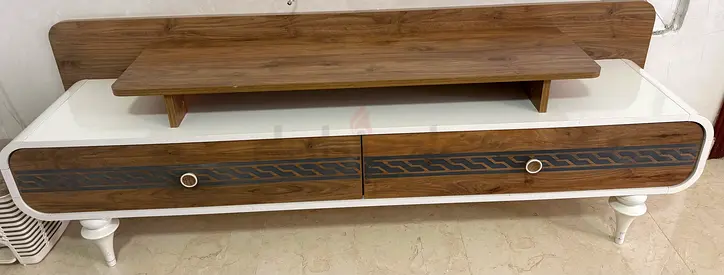 Wood and white TV cabinet with raised shelf - good condition