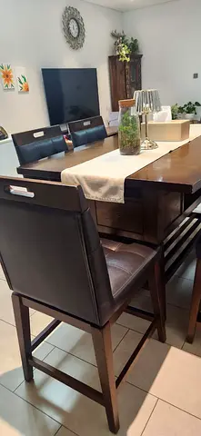 Homecentre Solidwood Dining table with rotating chair and