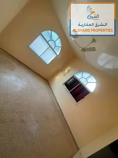 Residential and commercial villa for annual rent in Al Rawda 2 - Ajman, with spacious areas and a pr