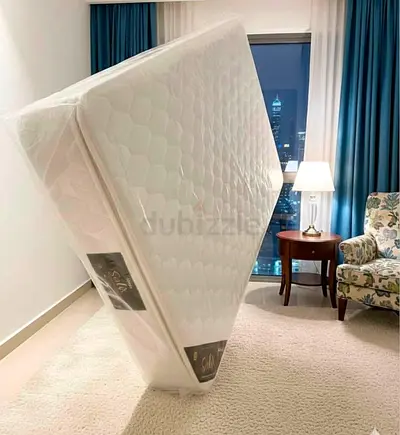 Almost-new Queen Mattress in Protective Cover, Firm Comfort