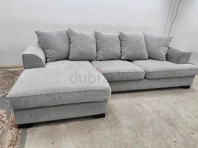 The one brand light grey lshape sofa