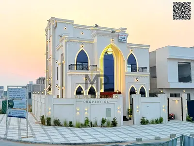 New corner villa with a full stone facade and central air conditioning in a prestigious residential