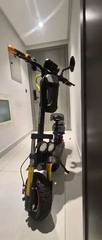 Used Electric Scooter with Fat Tires and Dual Gauges with extra bag and phone holder— Good Condition