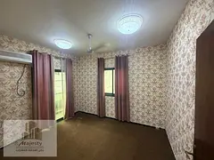 For rent: a -bedroom apartment with a living room in the Al Boutaina area, Sharjah.