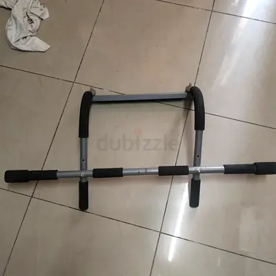 Used doorway pull-up/chin-up bar with foam grips - sturdy frame