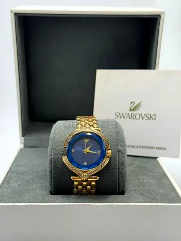 Swarovski Gold-tone Ladies Watch with Blue Dial - Excellent Condition