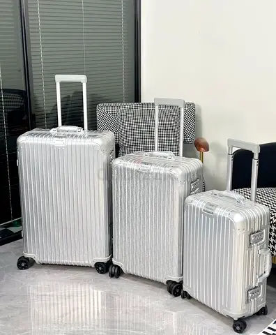 Rimowa x Dior travel luggage aluminum set