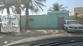 A house in Al-Sabkha, divided into two sections: the first section has 3 bedrooms, a living room, an