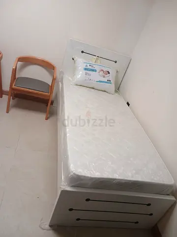 Brand new bed with mattress 20cm and pillow.