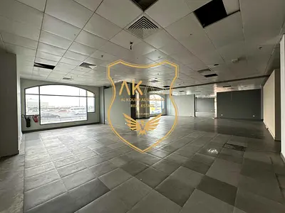 Massive 56,000 Sq Ft Showroom + Office | Main Itehad Road | Road Visibility | Basement Parking | Al