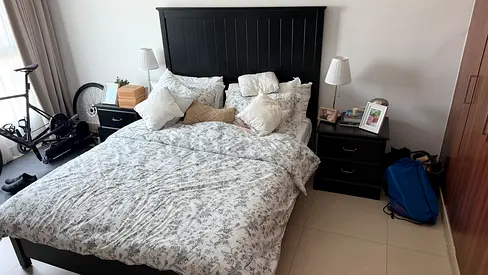 Bed with mattress and side tables
