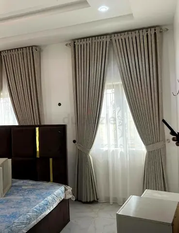 Light grey blackout curtains with sheer liners — set for bedroom windows