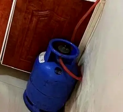Used Blue Cooking Gas Cylinder and stove