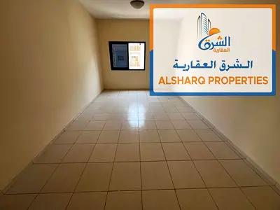 شقة غرفتين وصالة بمساحة كبيرة للإيجار في النعيمية 2، بلكونة بإطلالة مفتوحة وتصميم عملي في موقع حيوي قريب من جميع الخدمات
