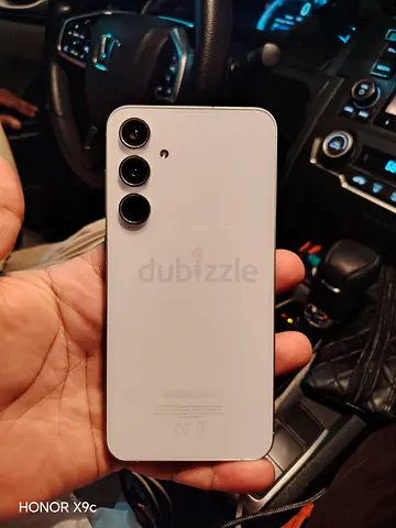 Samsung white smartphone with triple rear cameras - good condition