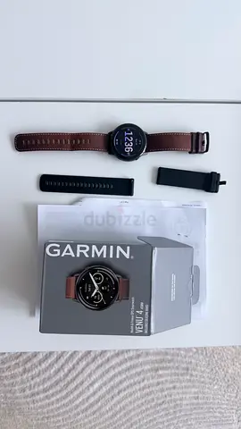 Garmin Venu 4 smartwatch with extra bands and original box