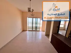 One bedroom and living room in Emirates City, Al Amerah area, balcony with open view, central air co