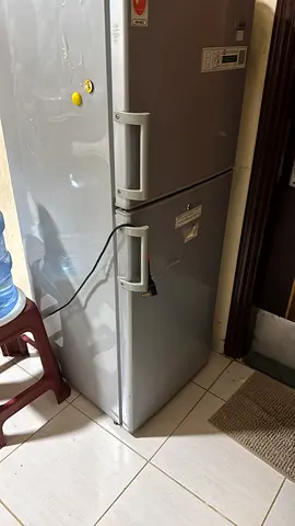 Silver double-door refrigerator - good working condition