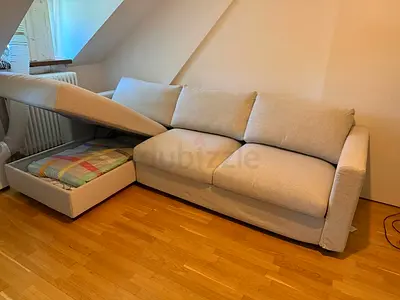 Beige 3-seater sofa bed with storage, good condition