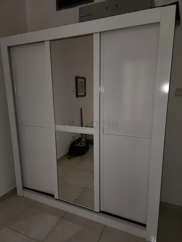 Danube Home White sliding door wardrobe with mirrored panel, good condition