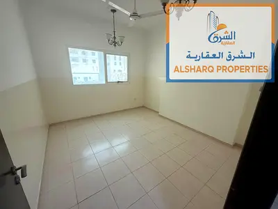 Two bedrooms and a living room In Ajman Industrial Area Next to Day to Day On Al Ittihad Street Central air conditioning 2 bathrooms 37,000 AED Four i