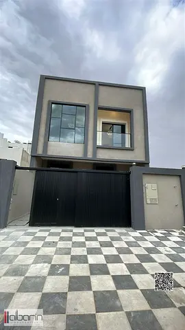 Villa for sale in Ajman: 5-bedroom townhouse (all master bedrooms) with a spacious living area.
