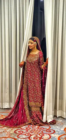 Authentic maroon bridal lehenga with heavy gold embroidery - used once