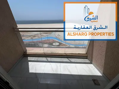 Directly on Ajman Corniche Three-bedroom apartment with a living room First occupancy Sea view 60,000 AED