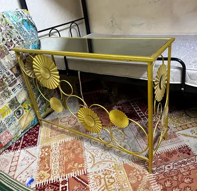 Gold Metal Console Table with Floral Metalwork and Glass Top