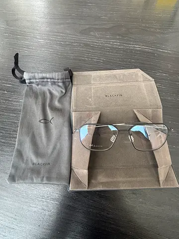 Blackfin metal frame eyeglasses with soft pouch and case.