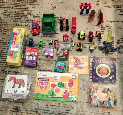 Mixed kids toys bundle — cars, dinosaurs, puzzles, board & learning toys