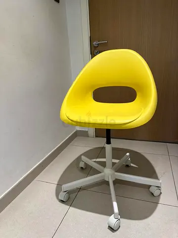 2 Pcs Yellow swivel office chairs on wheels - compact and adjustable